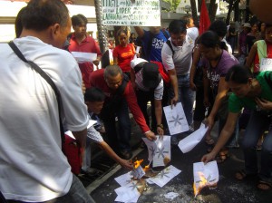 Symbolic burning of Warrant of Arrests for Roy, Amy and 30 others (Dec 10, 2012)